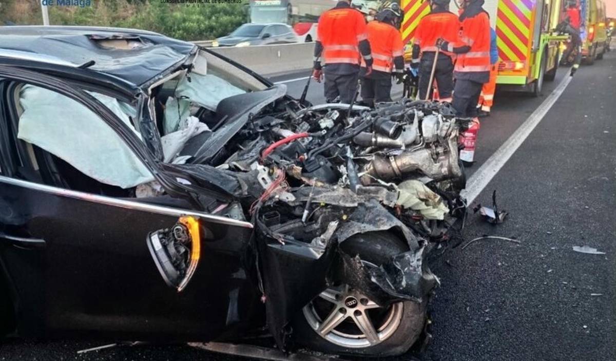 Caos en Málaga por el 'efecto mirón': un accidente deja un atrapado y siete kilómetros de cola