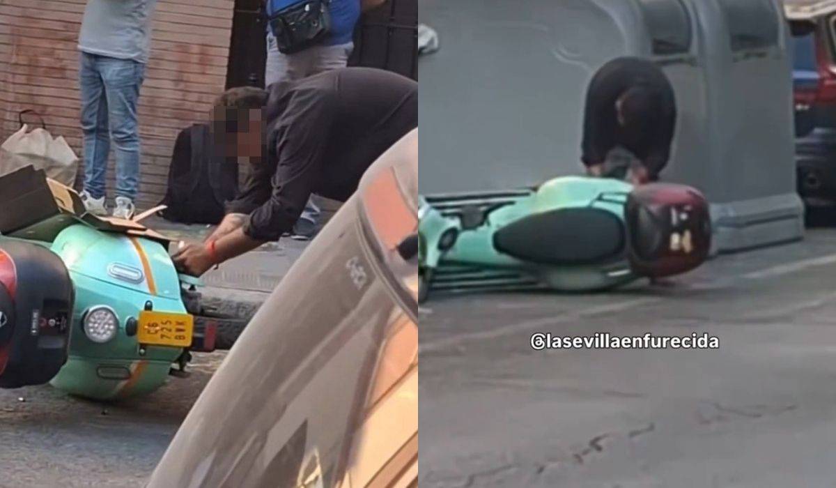 Intenta quemar una moto de alquiler en plena calle de Sevilla tras patear varios contenedores