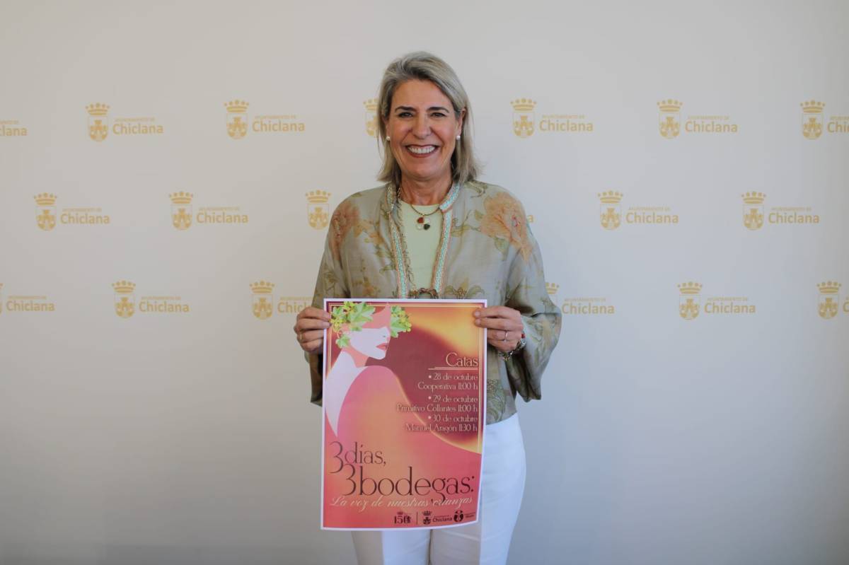 Martínez Rico, con el cartel de las catas. - Martínez Rico, con el cartel de las catas.