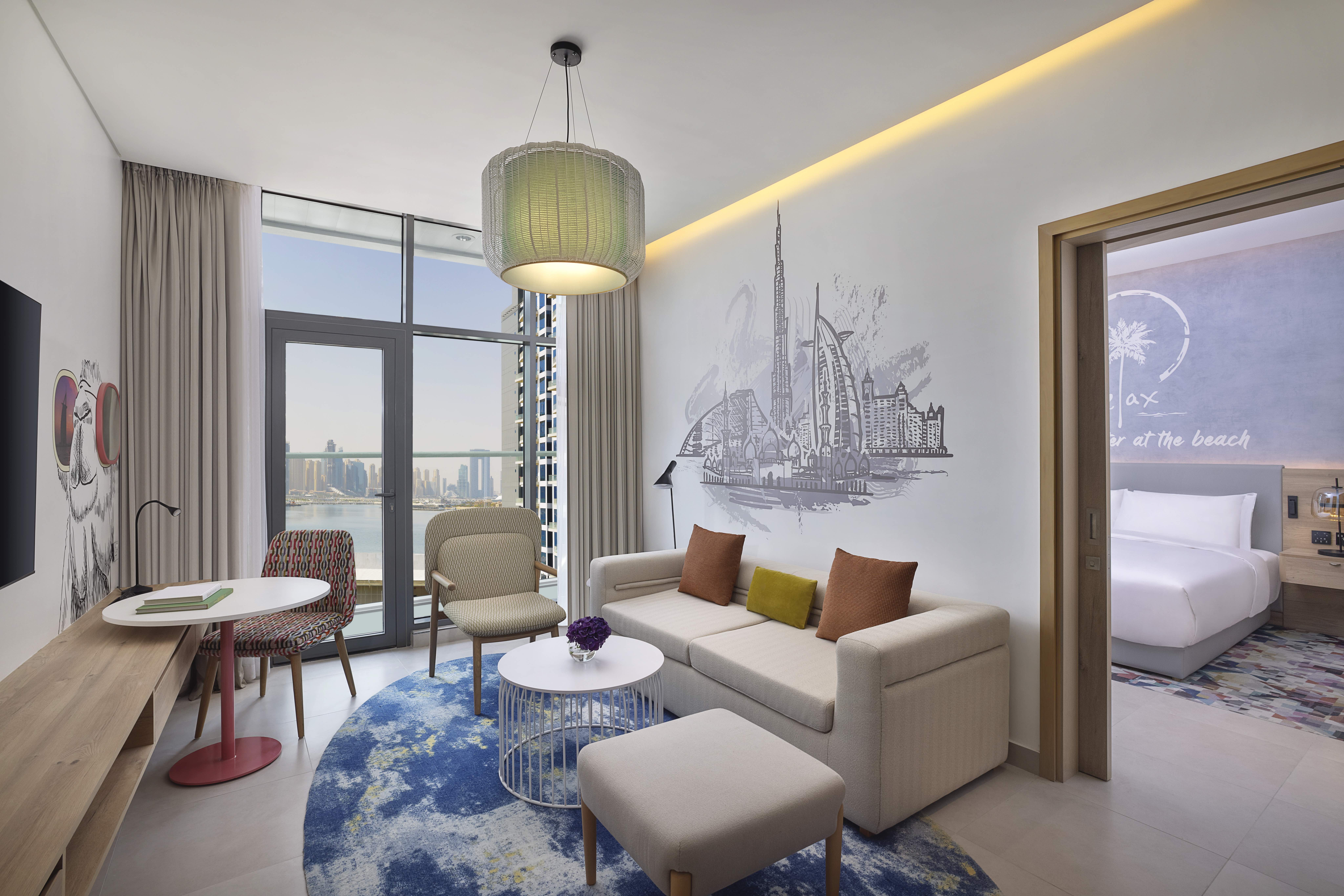 NH Collection Dubai The Palm   Guest Room One Bedroom Suite Living Area