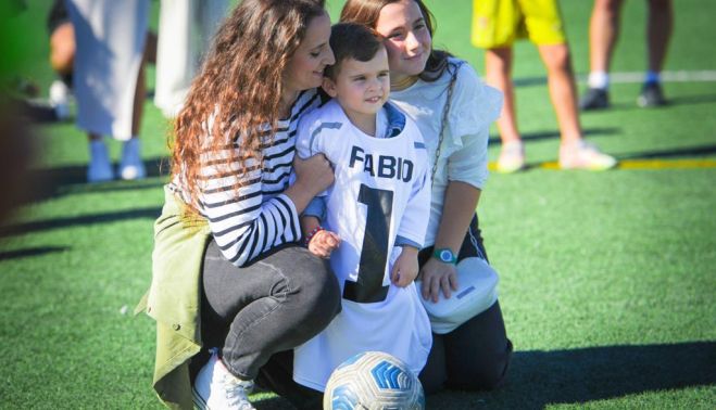 El hijo de Fabio, antes de comenzar el torneo.